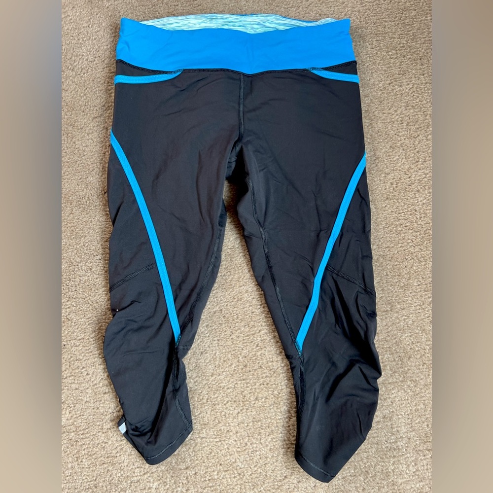 Lululemon Run Pace Crop Leggings. Size 6. Black with Bright Blue Detail